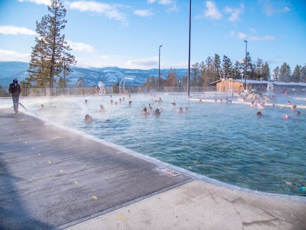 Steam rising off the mineral hot pool at Fairmont Hot Springs Resort in winter