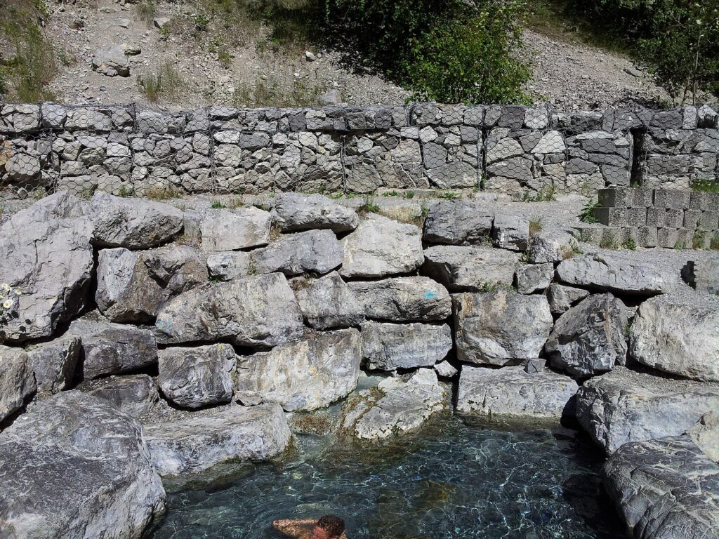 Rock pools beside the Lussier River at Lussier Hot Springs